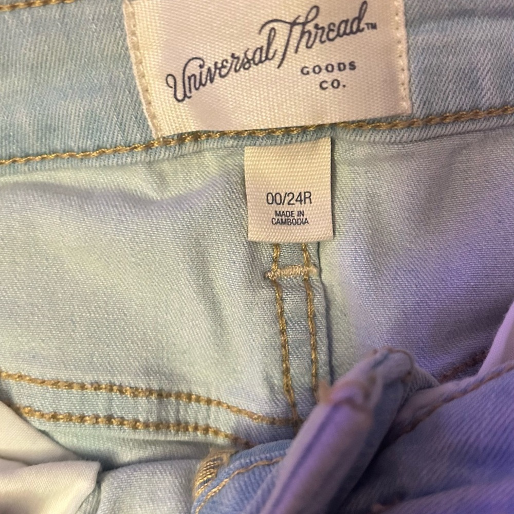 Universal Thread Blue Jeans with Contrast Stitching and Distressed Look